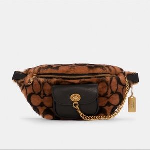 SOLD OUT! Coach X Jennifer Lopez Chain Belt
Bag In Signature Shearling Fanny